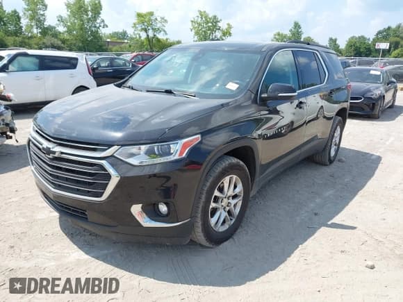 ✅ 2021 Chevrolet Traverse LT Cloth • VIN: 1GNERGKW5MJ124858 • Lot: 42960251. Listed on IAAI with 89,527 mi. Free auction sales archive from the USA and detailed vehicle history report at DreamBid. Image 2.
