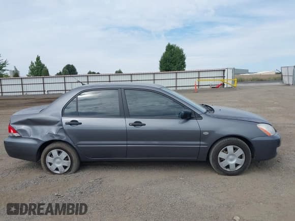 ✅ 2005 Mitsubishi Lancer ES • VIN: JA3AJ26E85U010743 • Lot: 42906511. Listed on IAAI with 97,975 mi. Free auction sales archive from the USA and detailed vehicle history report at DreamBid. Image 13.