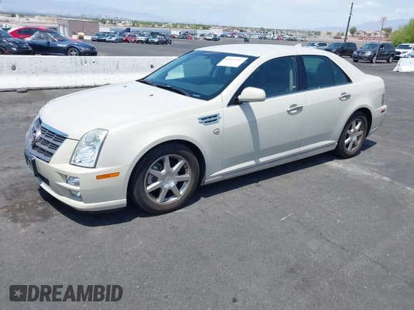 ✅ 2010 Cadillac STS AWD • VIN: 1G6DU6EV5A0147190 • Lot: 42432227. Wystawiony na IAAI z przebiegiem 132 965 mil. Bezpłatny archiwum sprzedaży aukcyjnych z USA i szczegółowy raport historii pojazdu na DreamBid. Zdjęcie 2.