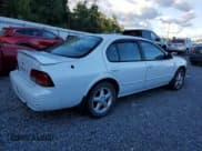 ✅ 1997 Nissan Maxima GXE • VIN: JN1CA21D2VT853791 • Lot: 86539965. Listed on Copart with 220,592 mi. Free auction sales archive from the USA and detailed vehicle history report at DreamBid. Image 3.