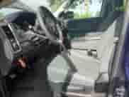 2016 Ram 1500 Express with VIN 1C6RR7FG0GS409762, listed as a Copart auction lot 59237055 with 75,307 mi miles and Salvage title. Bid and sale history available at DreamBid. Image 7.