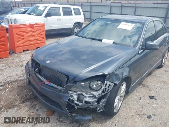 ✅ 2014 Mercedes-Benz C 250 Sport • VIN: WDDGF4HB0EA936265 • Lot: 42090412. Listed on IAAI with 113,695 mi. Free auction sales archive from the USA and detailed vehicle history report at DreamBid. Image 2.