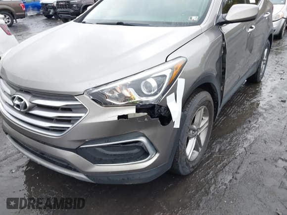 ✅ 2018 Hyundai Santa Fe 2.4L • VIN: 5NMZTDLB2JH095519 • Лот: 43462708. Опубликован ранее на IAAI с пробегом 87 498 миль. Бесплатный доступ к архиву аукционных продаж из США и подробный отчёт об истории автомобиля на DreamBid. Изображение 6.