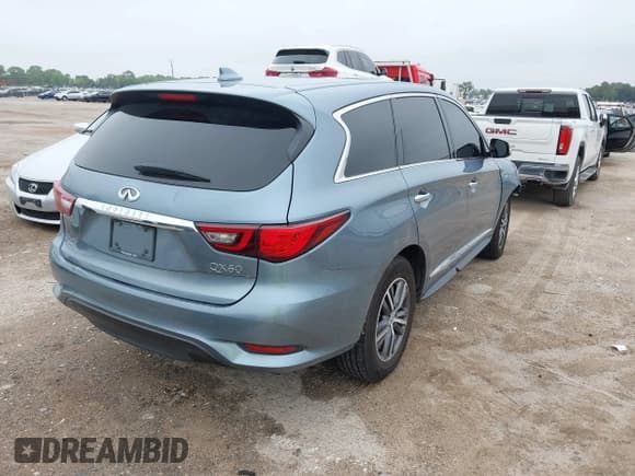 ✅ 2018 Infiniti QX60 • VIN: 5N1DL0MM7JC520990 • Lot: 43120369. Listed on IAAI with 136,312 mi. Free auction sales archive from the USA and detailed vehicle history report at DreamBid. Image 4.