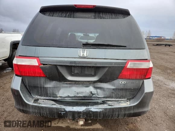 ✅ 2005 Honda Odyssey EX-L • VIN: 5FNRL38615B501223 • Lot: 93496935. Listed on Copart with 301,216 mi. Free auction sales archive from the USA and detailed vehicle history report at DreamBid. Image 6.