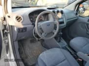 ✅ 2010 Ford Transit Connect XLT • VIN: NM0LS7BN2AT001849 • Lot: 85883384. Listed on Copart with 146,841 mi. Free auction sales archive from the USA and detailed vehicle history report at DreamBid. Image 8.