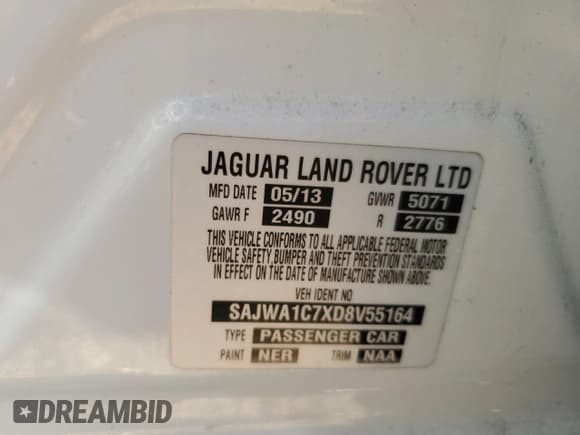 ✅ 2013 Jaguar XJ • VIN: SAJWA1C7XD8V55164 • Лот: 80382115. Опубликован ранее на Copart с пробегом 69 465 миль. Бесплатный доступ к архиву аукционных продаж из США и подробный отчёт об истории автомобиля на DreamBid. Изображение 13.