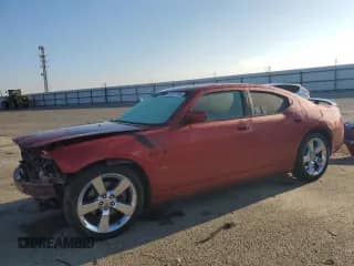 2006 Dodge Charger R/T с VIN 2B3KA53H86H521803, выставлен на аукционе Copart как лот 82570765 с пробегом 224 135 миль миль и Списание • Salvage title. История ставок и продаж доступна на DreamBid. Изображение 1.