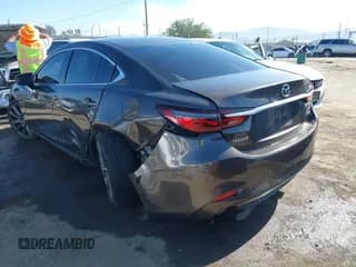 ✅ 2019 Mazda 6 Touring • VIN: JM1GL1VM1K1500169 • Лот: 43045258. Опубликован ранее на IAAI с пробегом 100 016 миль. Бесплатный доступ к архиву аукционных продаж из США и подробный отчёт об истории автомобиля на DreamBid. Изображение 3.