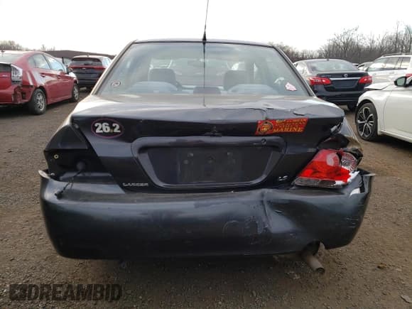 ✅ 2004 Mitsubishi Lancer LS • VIN: JA3AJ36E34U036316 • Lot: 87617655. Listed on Copart with 140,855 mi. Free auction sales archive from the USA and detailed vehicle history report at DreamBid. Image 6.
