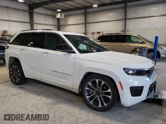 ✅ 2022 Jeep Grand Cherokee Overland • VIN: 1C4RJYD68N8716557 • Lot: 86807614. Listed on Copart with 12,590 mi. Free auction sales archive from the USA and detailed vehicle history report at DreamBid. Image 4.