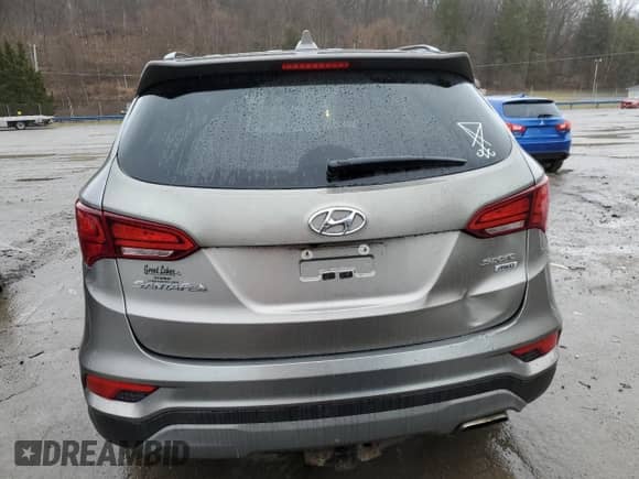 ✅ 2018 Hyundai Santa Fe 2.4L • VIN: 5XYZUDLBXJG570714 • Lot: 44275493. Wystawiony na Copart z przebiegiem 77 032 mil mil. Skorzystaj z bezpłatnego archiwum sprzedaży aukcyjnych z USA i zobacz szczegółowy raport historii pojazdu na DreamBid. Zdjęcie 6.