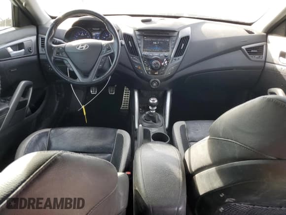 ✅ 2014 Hyundai Veloster Turbo • VIN: KMHTC6AE9EU184531 • Lot: 79663444. Wystawiony na Copart z przebiegiem 81 865 mil. Bezpłatny archiwum sprzedaży aukcyjnych z USA i szczegółowy raport historii pojazdu na DreamBid. Zdjęcie 8.