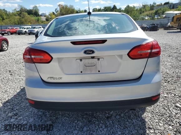 ✅ 2018 Ford Focus S • VIN: 1FADP3E26JL310278 • Lot: 86059275. Wystawiony na Copart z przebiegiem 9 427 mil. Bezpłatny archiwum sprzedaży aukcyjnych z USA i szczegółowy raport historii pojazdu na DreamBid. Zdjęcie 6.