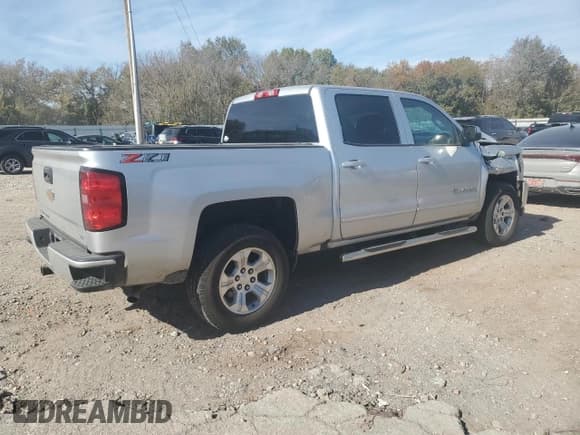 ✅ 2018 Chevrolet Silverado 1500 LT • VIN: 3GCUKREC3JG540975 • Лот: 91246495. Опубликован ранее на Copart с пробегом 250 445 миль. Бесплатный доступ к архиву аукционных продаж из США и подробный отчёт об истории автомобиля на DreamBid. Изображение 3.
