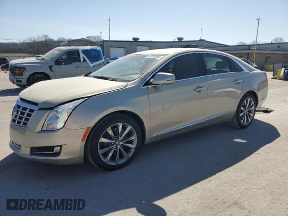 ✅ 2015 Cadillac XTS • VIN: 2G61L5S30F9114601 • Lot: 48796055. Listed on Copart with 64,986 mi. Free auction sales archive from the USA and detailed vehicle history report at DreamBid. Image 1.
