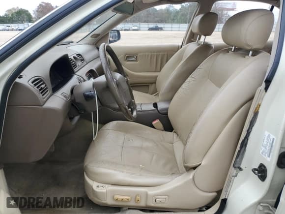 ✅ 1997 Infiniti J30 Personal Luxury • VIN: JNKAY21DXVM504659 • Lot: 84903784. Wystawiony na Copart z przebiegiem 158 954 mil. Bezpłatny archiwum sprzedaży aukcyjnych z USA i szczegółowy raport historii pojazdu na DreamBid. Zdjęcie 7.