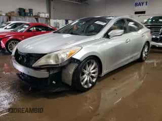 2012 Hyundai Azera с VIN KMHFH4JG6CA150808, выставлен на аукционе Copart как лот 46639735 с пробегом 100 089 миль миль и Списание • Salvage title. История ставок и продаж доступна на DreamBid. Изображение 1.