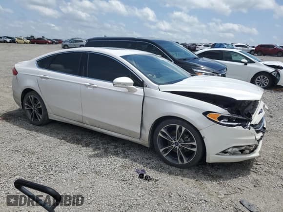 ✅ 2018 Ford Fusion Titanium • VIN: 3FA6P0K99JR160631 • Lot: 61489925. Listed on Copart with 183,383 mi. Free auction sales archive from the USA and detailed vehicle history report at DreamBid. Image 4.