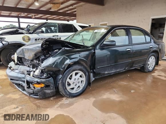 ✅ 1997 Nissan Maxima GXE • VIN: JN1CA21DXVT214994 • Lot: 71049905. Listed on Copart with 158,916 mi. Free auction sales archive from the USA and detailed vehicle history report at DreamBid. Image 1.