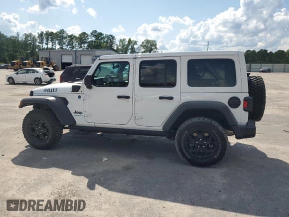 ✅ 2023 Jeep Wrangler • VIN: 1C4JJXN62PW613106 • Лот: 61717015. Опубликован ранее на Copart с пробегом 18 365 миль. Бесплатный доступ к архиву аукционных продаж из США и подробный отчёт об истории автомобиля на DreamBid. Изображение 2.
