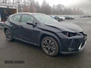 ✅ 2021 Lexus UX 250h • VIN: JTHP9JBH9M2038591 • Лот: 93892595. Опубликован ранее на Copart с пробегом 76 345 миль. Бесплатный доступ к архиву аукционных продаж из США и подробный отчёт об истории автомобиля на DreamBid. Изображение 4.