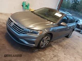 ✅ 2021 Volkswagen Jetta SEL • VIN: 3VWE57BU7MM070059 • Lot: 43610005. Listed on IAAI with 58,091 mi. Free auction sales archive from the USA and detailed vehicle history report at DreamBid. Image 2.