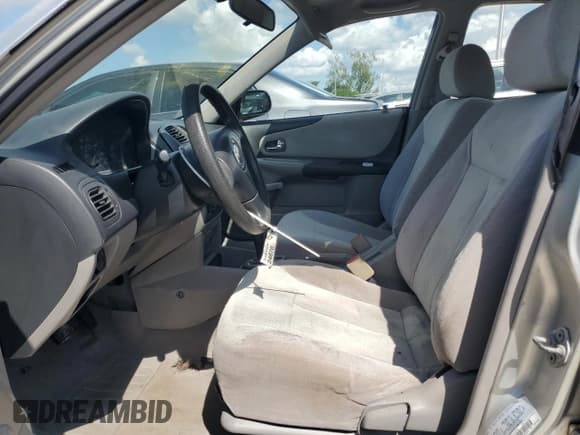 ✅ 2002 Mazda Protege DX • VIN: JM1BJ225320634626 • Lot: 84905245. Wystawiony na Copart z przebiegiem 178 114 mil. Bezpłatny archiwum sprzedaży aukcyjnych z USA i szczegółowy raport historii pojazdu na DreamBid. Zdjęcie 7.