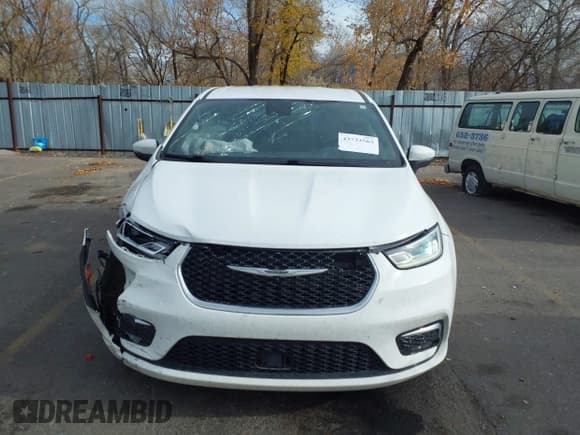 ✅ 2023 Chrysler Pacifica Touring • VIN: 2C4RC1FG5PR610811 • Lot: 43733563. Listed on IAAI with 55,492 mi. Free auction sales archive from the USA and detailed vehicle history report at DreamBid. Image 12.
