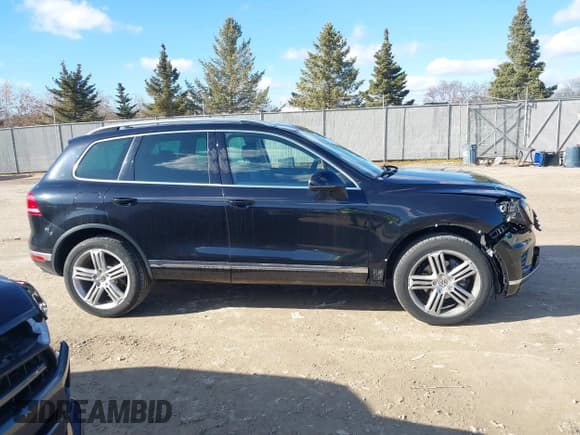 ✅ 2016 Volkswagen Touareg Lux • VIN: WVGEF9BP4GD001508 • Lot: 41850994. Wystawiony na IAAI z przebiegiem 63 355 mil. Bezpłatny archiwum sprzedaży aukcyjnych z USA i szczegółowy raport historii pojazdu na DreamBid. Zdjęcie 13.