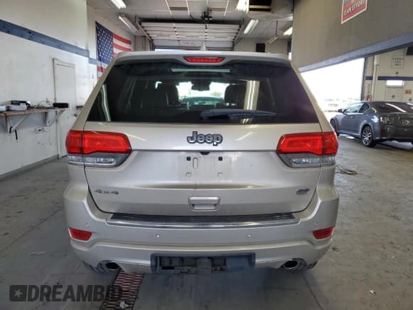 ✅ 2015 Jeep Grand Cherokee Overland • VIN: 1C4RJFCG7FC673181 • Lot: 46527875. Listed on Copart with 124,503 mi. Free auction sales archive from the USA and detailed vehicle history report at DreamBid. Image 6.