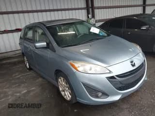 ✅ 2012 Mazda 5 Touring • VIN: JM1CW2CL1C0131939 • Lot: 43552511. Listed on IAAI with 171,138 mi. Free auction sales archive from the USA and detailed vehicle history report at DreamBid. Image 1.