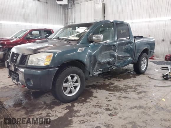 ✅ 2004 Nissan Titan LE • VIN: 1N6AA07B14N511618 • Lot: 41336419. Listed on IAAI with 195,863 mi. Free auction sales archive from the USA and detailed vehicle history report at DreamBid. Image 17.
