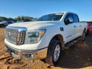 ✅ 2016 Nissan Titan Platinum Reserve • VIN: 1N6BA1F4XGN504751 • Lot: 90842885. Listed on Copart with 143,772 mi. Free auction sales archive from the USA and detailed vehicle history report at DreamBid. Image 1.