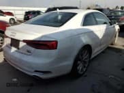 ✅ 2018 Audi A5 Premium • VIN: WAUNNAF55JA001699 • Лот: 43041905. Опубликован ранее на Copart с пробегом 55 938 миль. Бесплатный доступ к архиву аукционных продаж из США и подробный отчёт об истории автомобиля на DreamBid. Изображение 3.