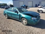 ✅ 1999 Pontiac Grand Am SE1 • VIN: 1G2NE52E6XC503882 • Lot: 64674975. Listed on Copart with 122,813 mi. Free auction sales archive from the USA and detailed vehicle history report at DreamBid. Image 4.