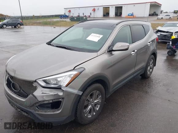 ✅ 2014 Hyundai Santa Fe • VIN: 5XYZUDLB9EG209397 • Lot: 43441268. Listed on IAAI with 128,741 mi. Free auction sales archive from the USA and detailed vehicle history report at DreamBid. Image 2.