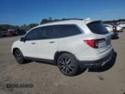 ✅ 2022 Honda Pilot Touring 7-Passenger • VIN: 5FNYF6H62NB007148 • Lot: 69777725. Listed on Copart with 54,748 mi. Free auction sales archive from the USA and detailed vehicle history report at DreamBid. Image 2.