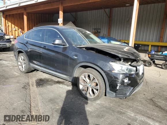 ✅ 2015 BMW X4 xDrive28i • VIN: 5UXXW3C52F0M86582 • Lot: 90933135. Listed on Copart with 150,918 mi. Free auction sales archive from the USA and detailed vehicle history report at DreamBid. Image 4.
