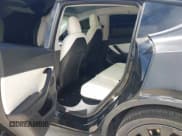 ✅ 2021 Tesla Model Y Standard Range • VIN: 5YJYGDED7MF103893 • Lot: 42892555. Listed on IAAI with 102,946 mi. Free auction sales archive from the USA and detailed vehicle history report at DreamBid. Image 8.