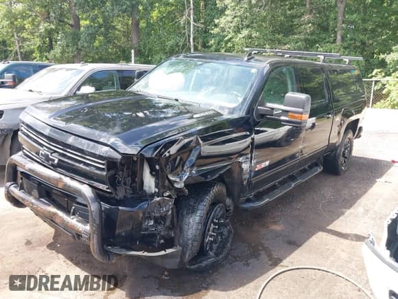 2016 Chevrolet Silverado 2500HD LT z VIN 1GC1KVE84GF246115, wystawiony jako IAAI lot #42601633 z przebiegiem 206 354 mil mil oraz . Historia ofert i sprzedaży dostępna na DreamBid. Obrazek 2.