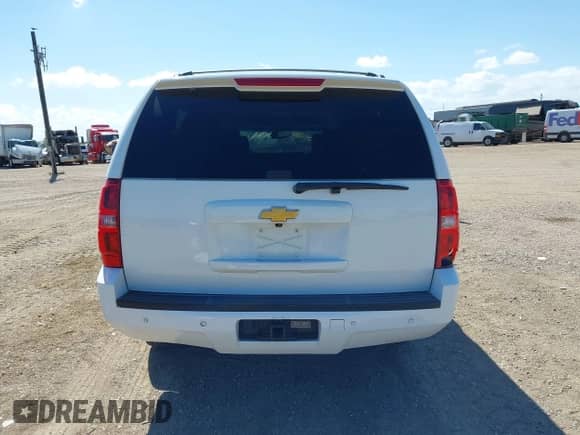 2014 Chevrolet Suburban LT z VIN 1GNSCJE0XER245963, wystawiony jako IAAI lot #43110230 z przebiegiem 160 648 mil mil oraz . Historia ofert i sprzedaży dostępna na DreamBid. Obrazek 17.