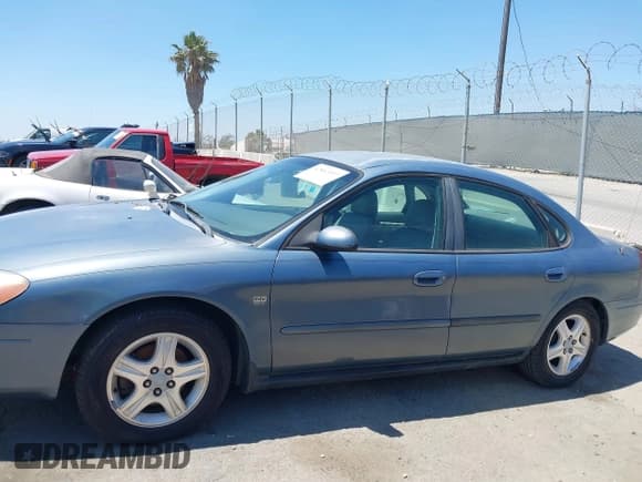 ✅ 2001 Ford Taurus SEL • VIN: 1FAHP56S41A119305 • Lot: 42842097. Listed on IAAI with 172,045 mi. Free auction sales archive from the USA and detailed vehicle history report at DreamBid. Image 14.