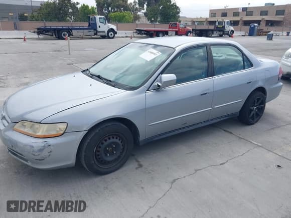✅ 2001 Honda Accord LX • VIN: 1HGCG56421A123022 • Lot: 42488903. Listed on IAAI with 139,479 mi. Free auction sales archive from the USA and detailed vehicle history report at DreamBid. Image 2.