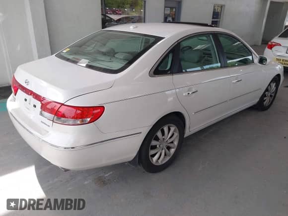 2007 Hyundai Azera SE с VIN KMHFC46F77A207828, выставлен на аукционе IAAI как лот 42813405 с пробегом 119 746 миль миль и . История ставок и продаж доступна на DreamBid. Изображение 4.