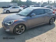 ✅ 2015 Hyundai Veloster • VIN: KMHTC6AD2FU239488 • Lot: 69609564. Wystawiony na Copart z przebiegiem 106 003 mil. Bezpłatny archiwum sprzedaży aukcyjnych z USA i szczegółowy raport historii pojazdu na DreamBid. Zdjęcie 1.