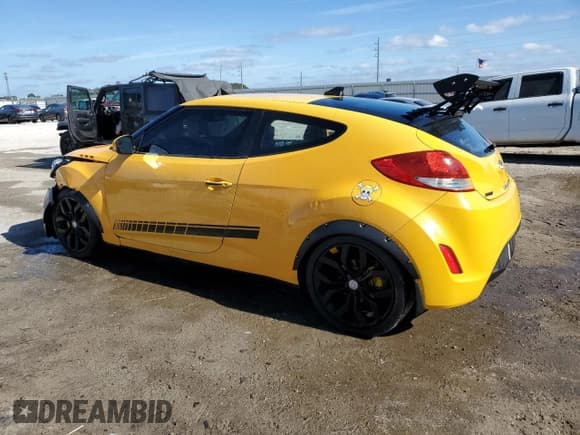 ✅ 2016 Hyundai Veloster • VIN: KMHTC6AD2GU272783 • Lot: 83958484. Listed on Copart with 56,461 mi. Free auction sales archive from the USA and detailed vehicle history report at DreamBid. Image 2.