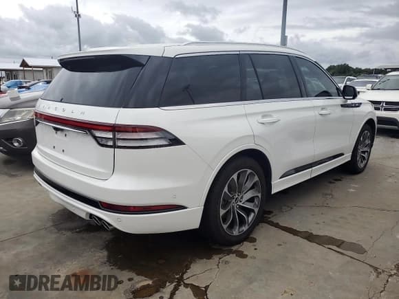 ✅ 2023 Lincoln Aviator Grand Touring • VIN: 5LMYJ8XY9PNL03214 • Лот: 74837264. Опубликован ранее на Copart с пробегом 4 981 миль. Бесплатный доступ к архиву аукционных продаж из США и подробный отчёт об истории автомобиля на DreamBid. Изображение 3.