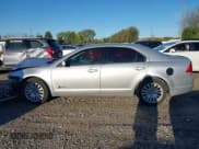 ✅ 2011 Ford Fusion Hybrid • VIN: 3FADP0L37BR335624 • Lot: 43479762. Listed on IAAI with 102,058 mi. Free auction sales archive from the USA and detailed vehicle history report at DreamBid. Image 14.