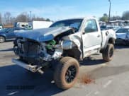 ✅ 2011 Toyota Tacoma • VIN: 5TFPX4EN1BX004171 • Lot: 41820438. Listed on IAAI with 184,028 mi. Free auction sales archive from the USA and detailed vehicle history report at DreamBid. Image 2.